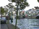 Kayaker in canal near hotel in Haarlem