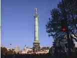 The Bastille monument, covered in technoids, showering the crowd with a message.