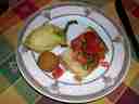 antipasti: bruschetta; fried, stuffed olive; fried, stuffed zucchini blossom
