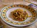 pasta in tomato, mushroom, and meat sauce