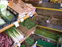 a produce shop -- look at the beautiful beans and yard-long 'zucchini'!